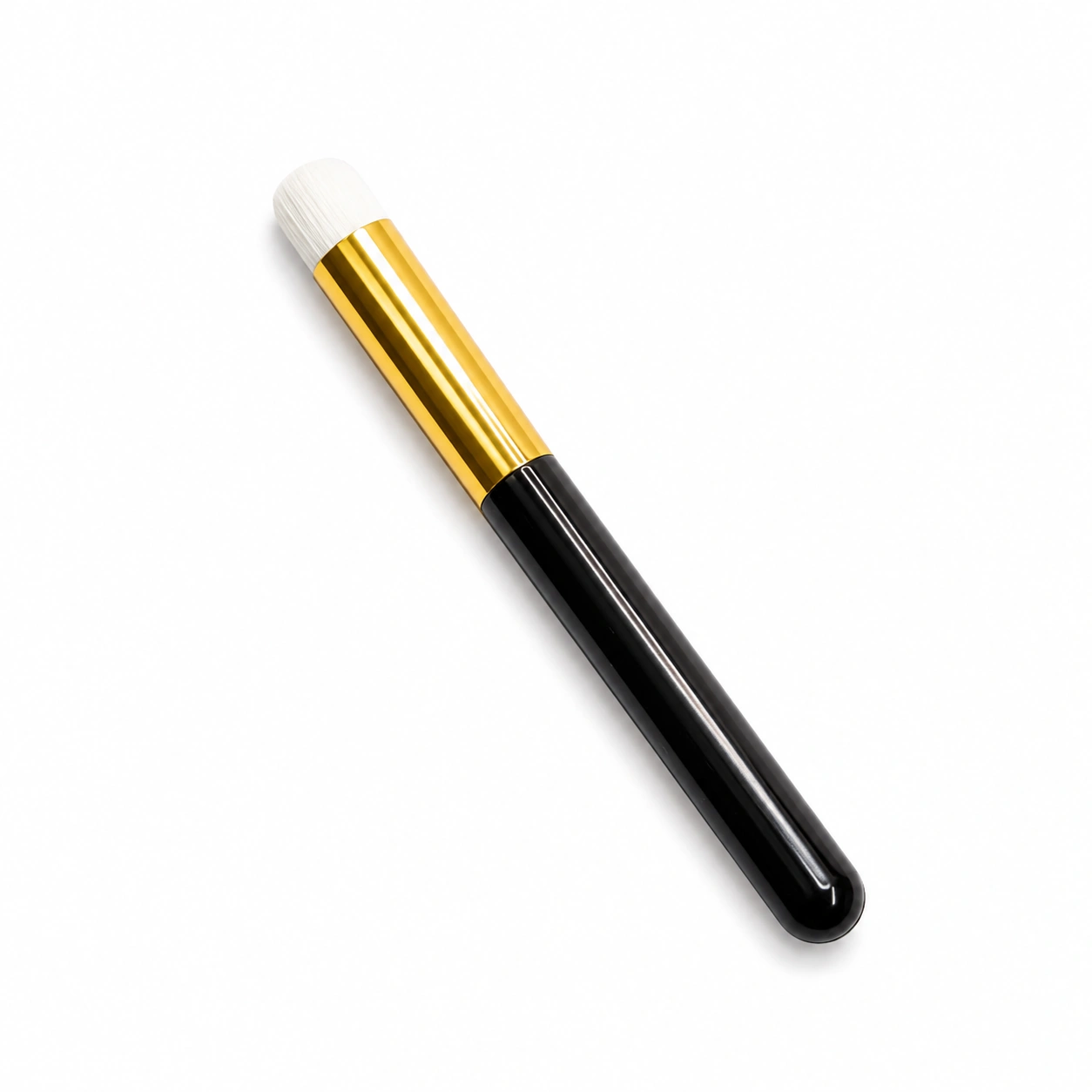 Black soft-bristled lash cleansing brush for gently deep-cleaning eyelash extensions with foaming lash shampoo.
