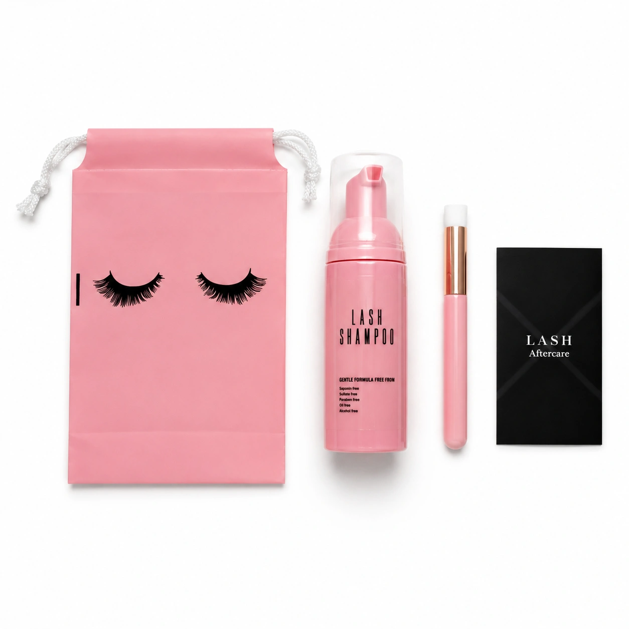Full Pink Standard Lash Kit including a lash shampoo bottle, soft cleansing brush, and aftercare card. Essential lash extension aftercare set designed to gently cleanse and maintain clean, healthy lashes.