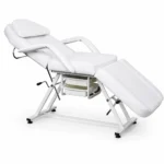 Adjustable Lash & Beauty Bed White – Professional beauty bed with adjustable backrest and leg sections, high-density foam cushioning, and easy-clean upholstery. Features removable armrests, a head pillow, and under-bed storage trays, making it ideal for lash, brow, and facial treatments.